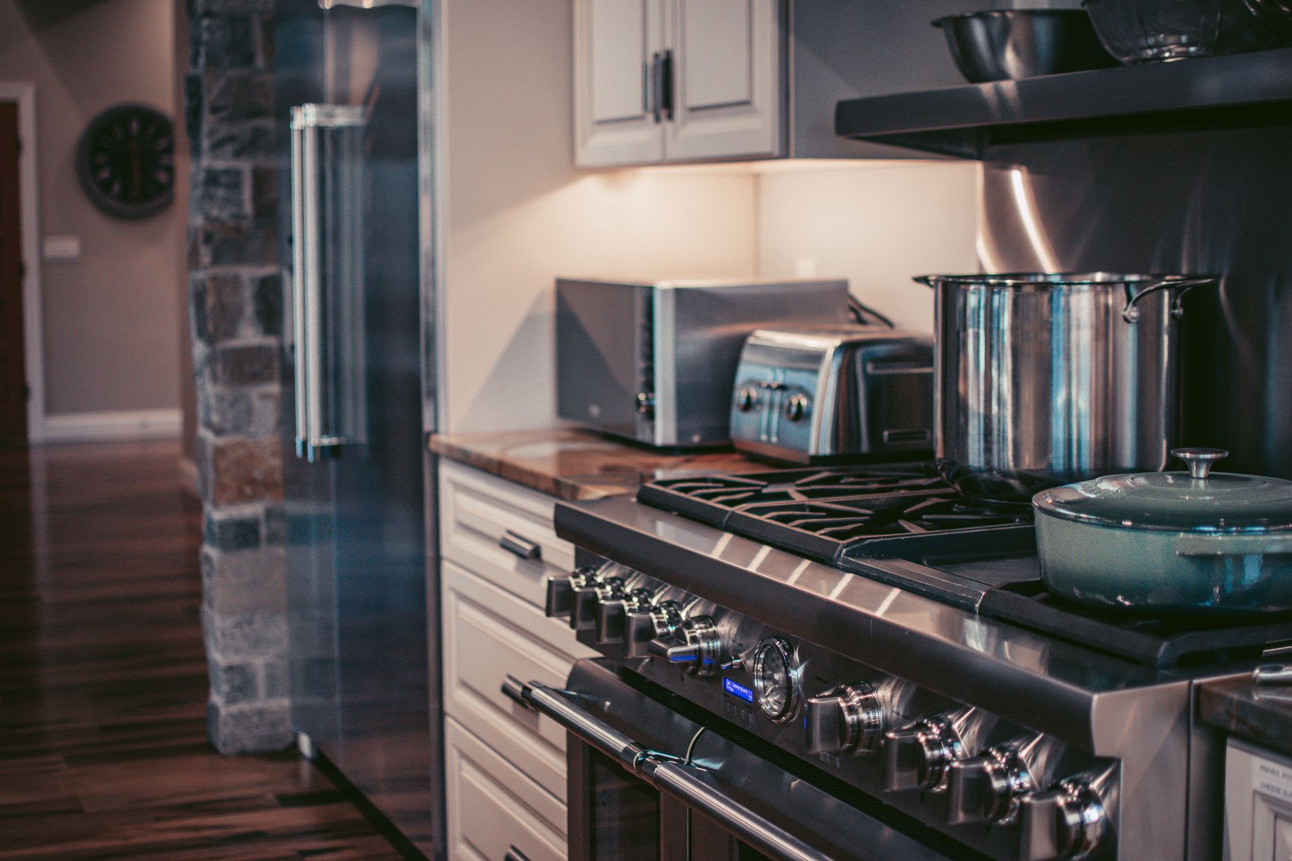 A stainless steel Breville countertop oven on a kitchen counter