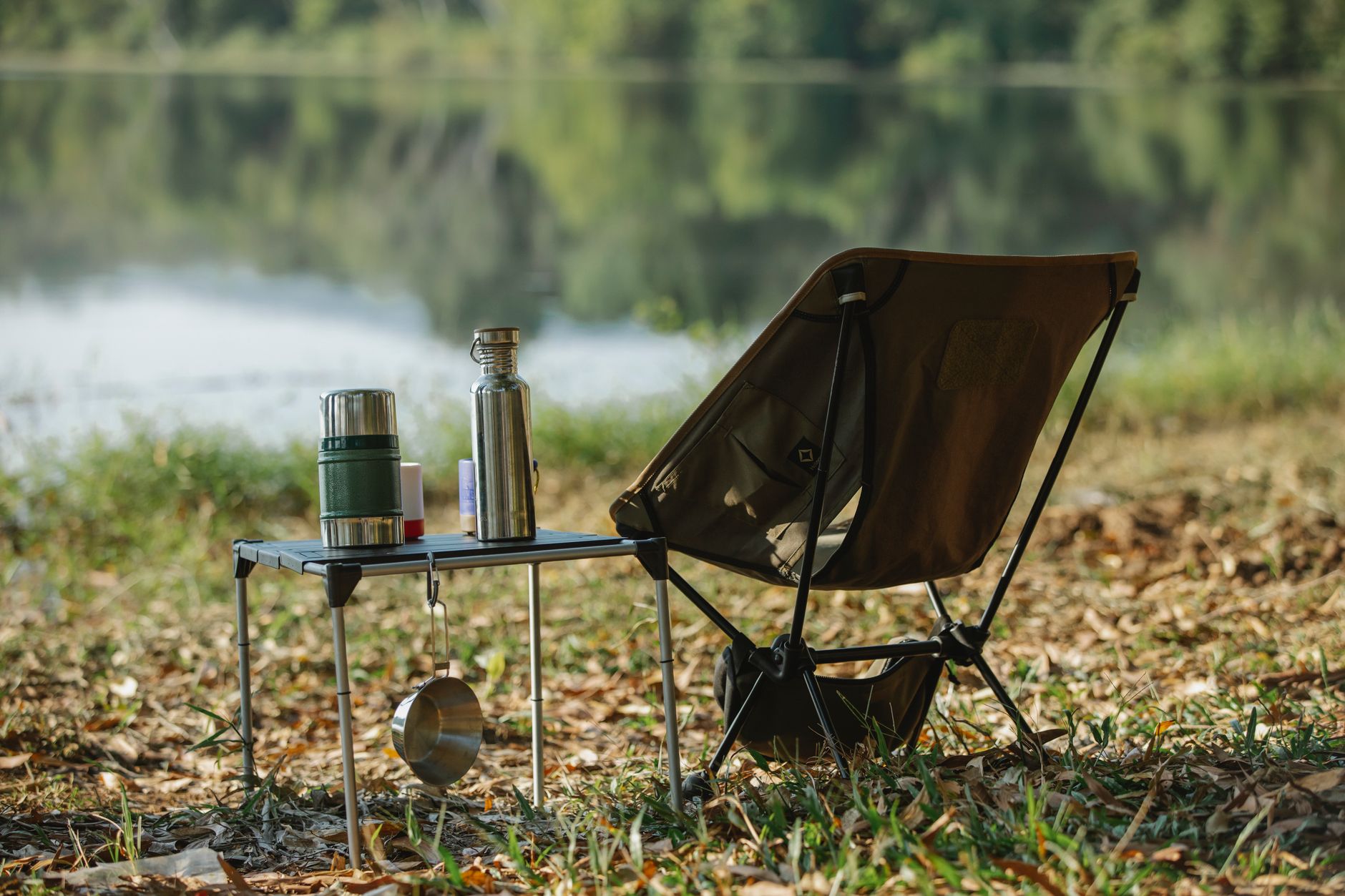 silver single wall stainless steel water bottle on a wooden table